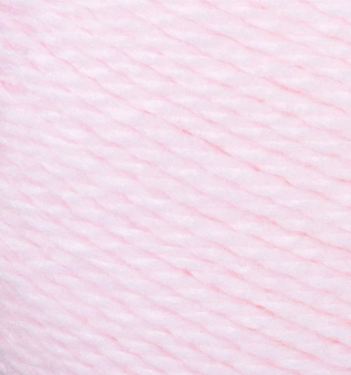Light pink yarn texture close-up with soft, fine fibers for baby projects.