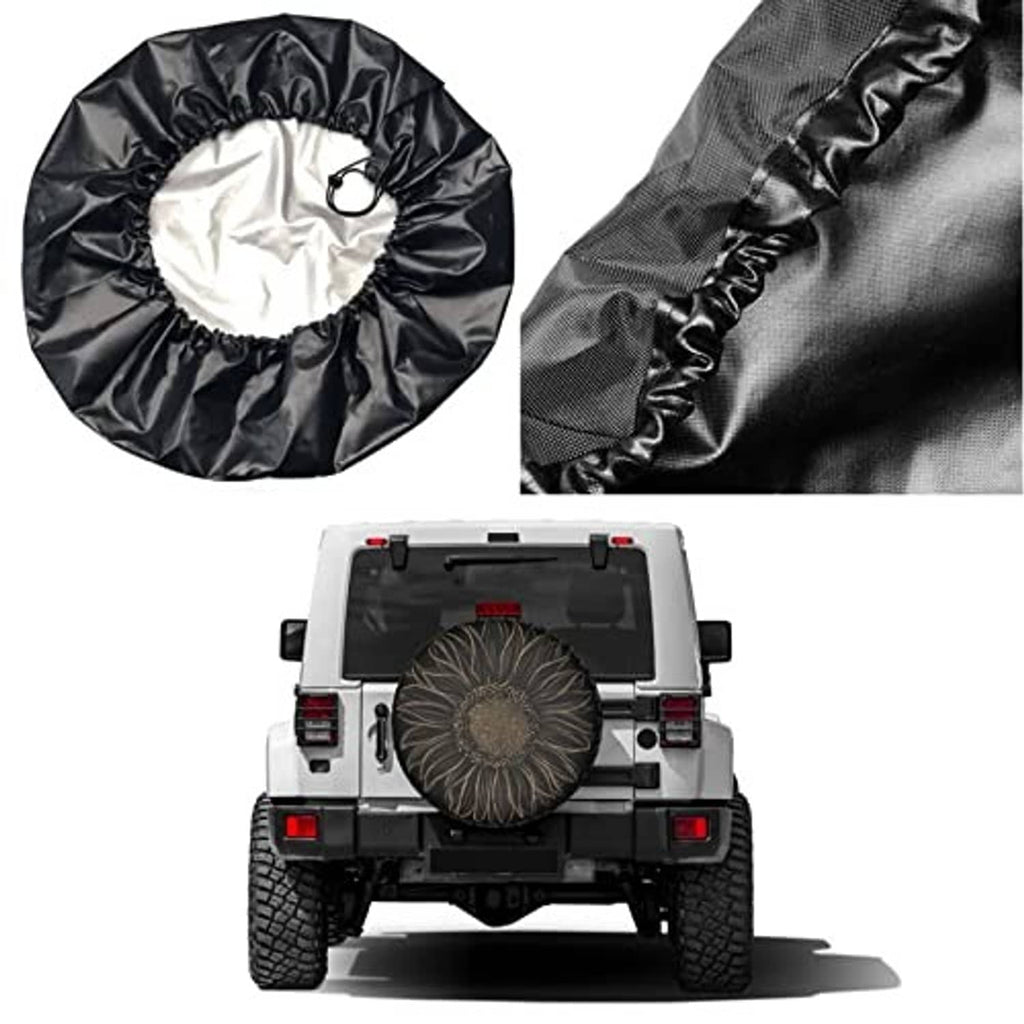 Black spare tire cover with gold floral design; drawstring edge detail
