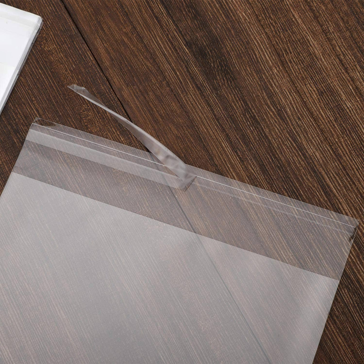 Clear self-seal cello bag with top seal flap, transparent plastic pouch