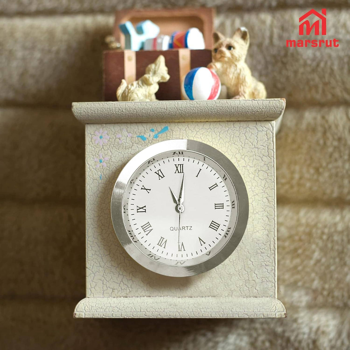 Wall-mounted clock face insert in textured panel, silver rim, white dial with Roman numerals