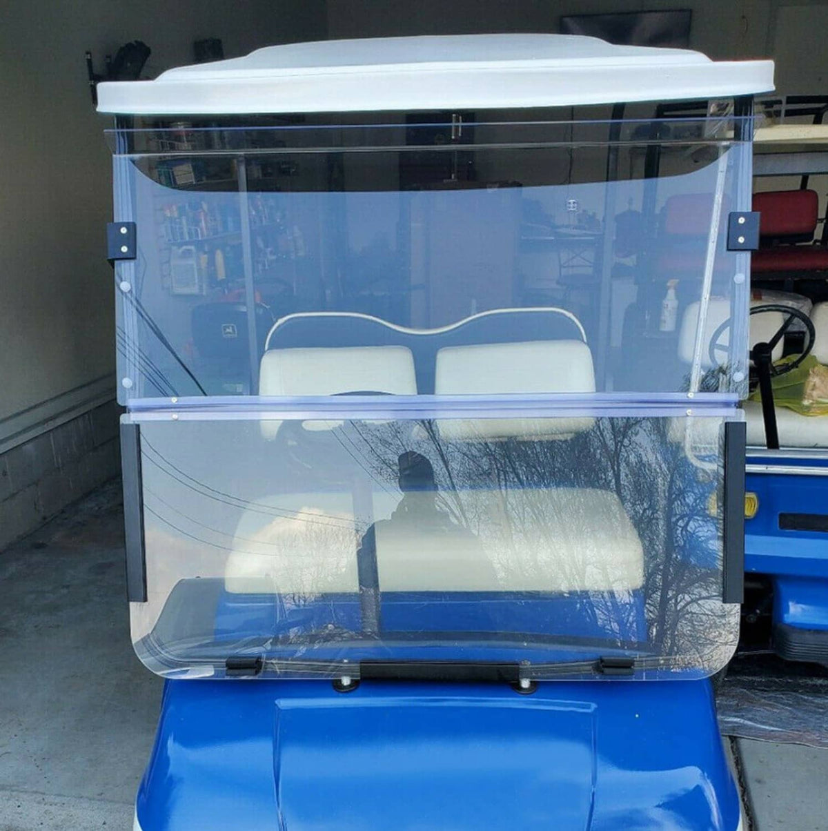Clear front windshield screen with metal frame for golf cart seat area