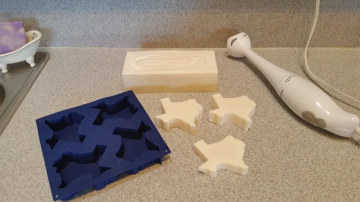 Silicone Texas baking mold on countertop with light-colored baked pieces