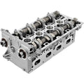 Aluminum cylinder head with camshaft housings and intake/exhaust ports