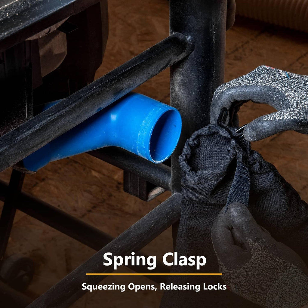 Black dust port bag with spring clasp for secure connection to a table saw dust port