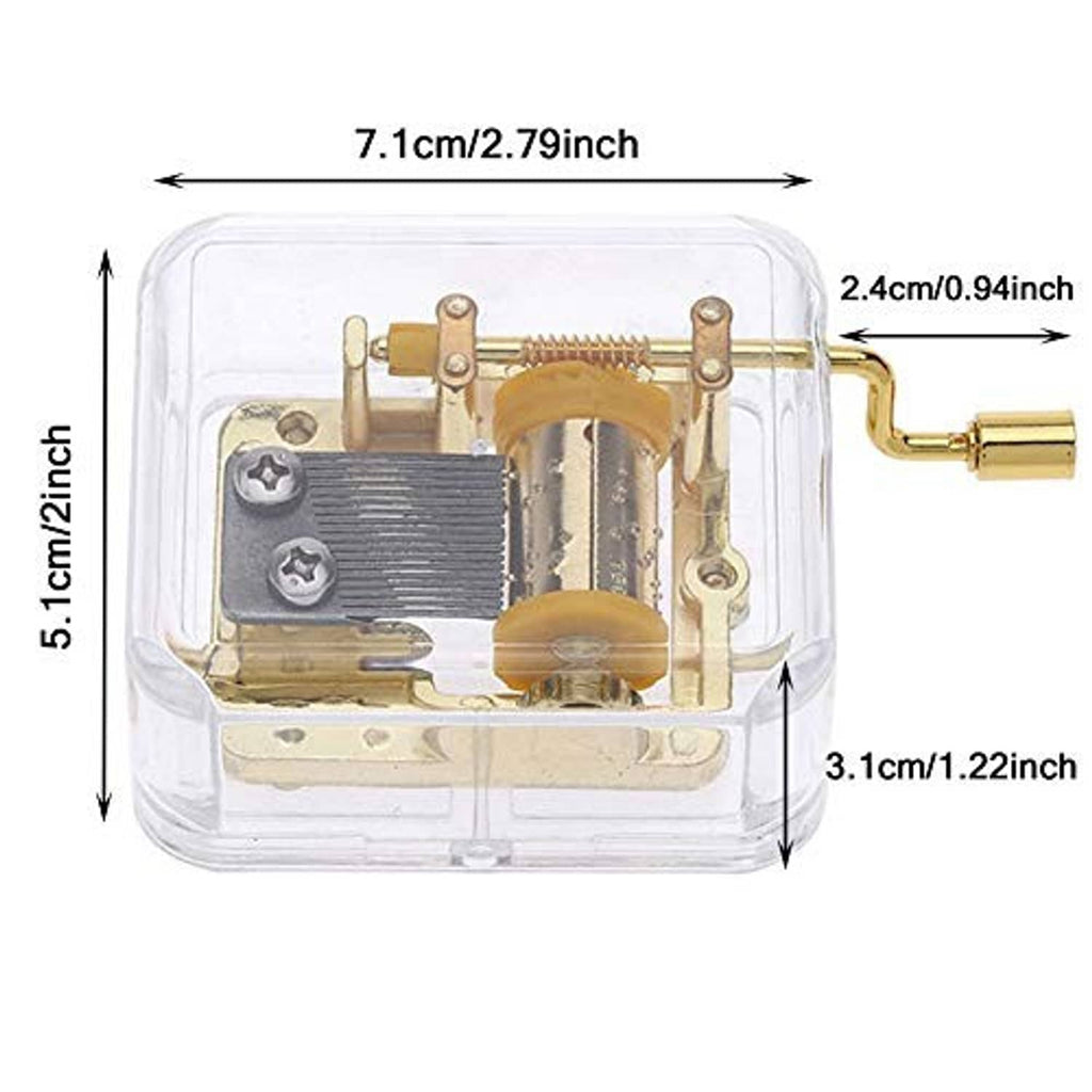 Hand-crank music box with clear case and gold mechanism shown with size measurements.