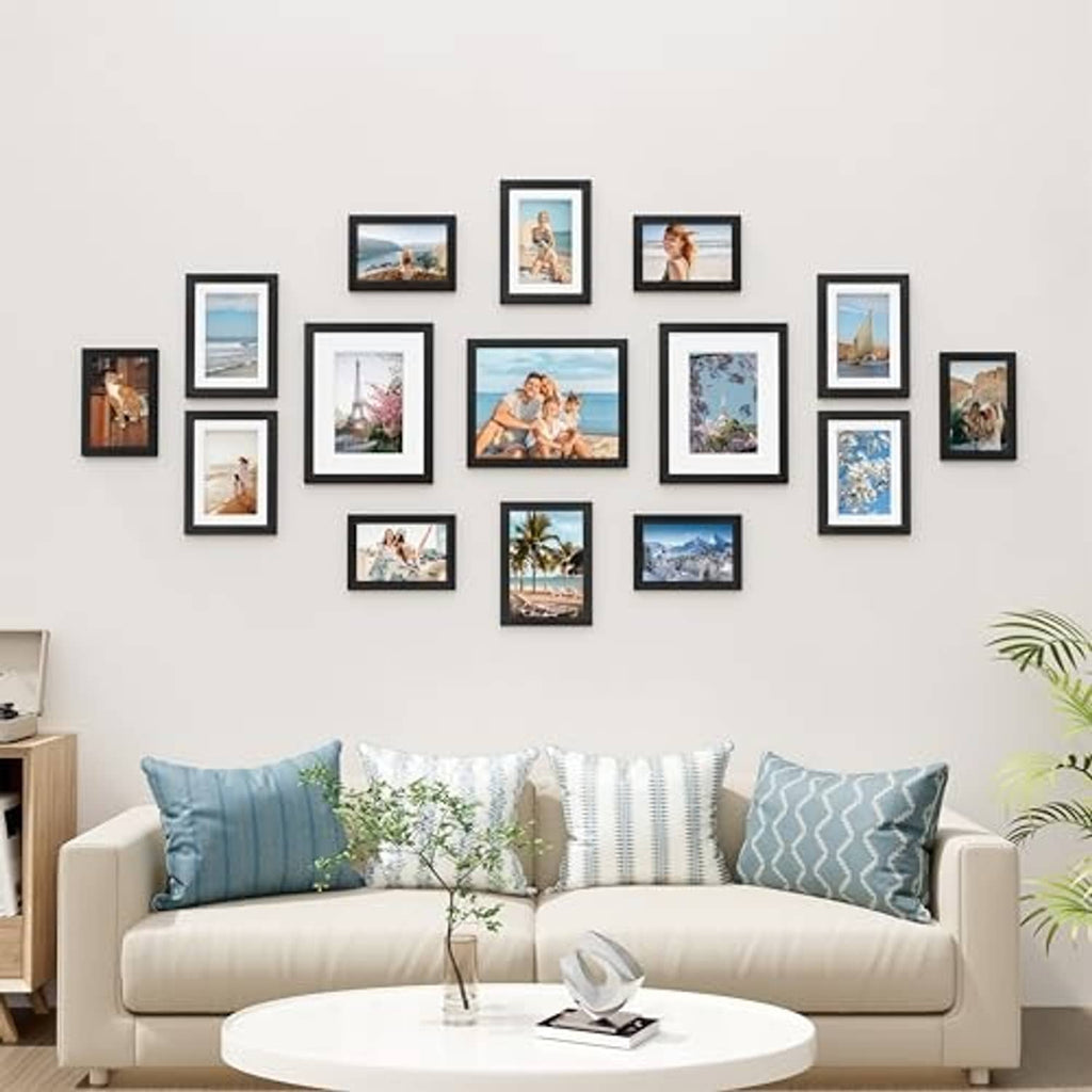 Black picture frame collage wall set with mixed photo sizes and layouts