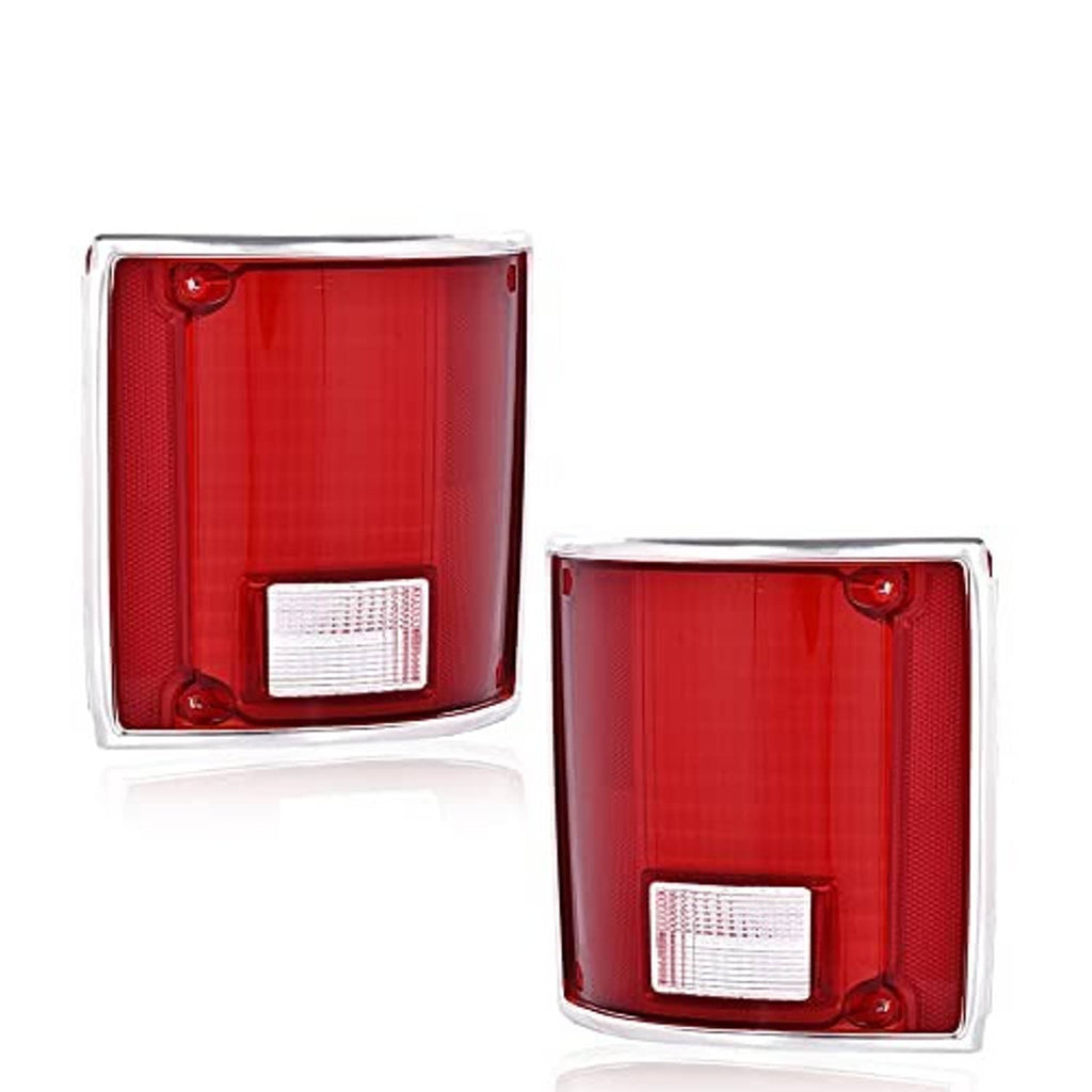 Pair of red tail lights with white rectangular reflector and chrome edging.