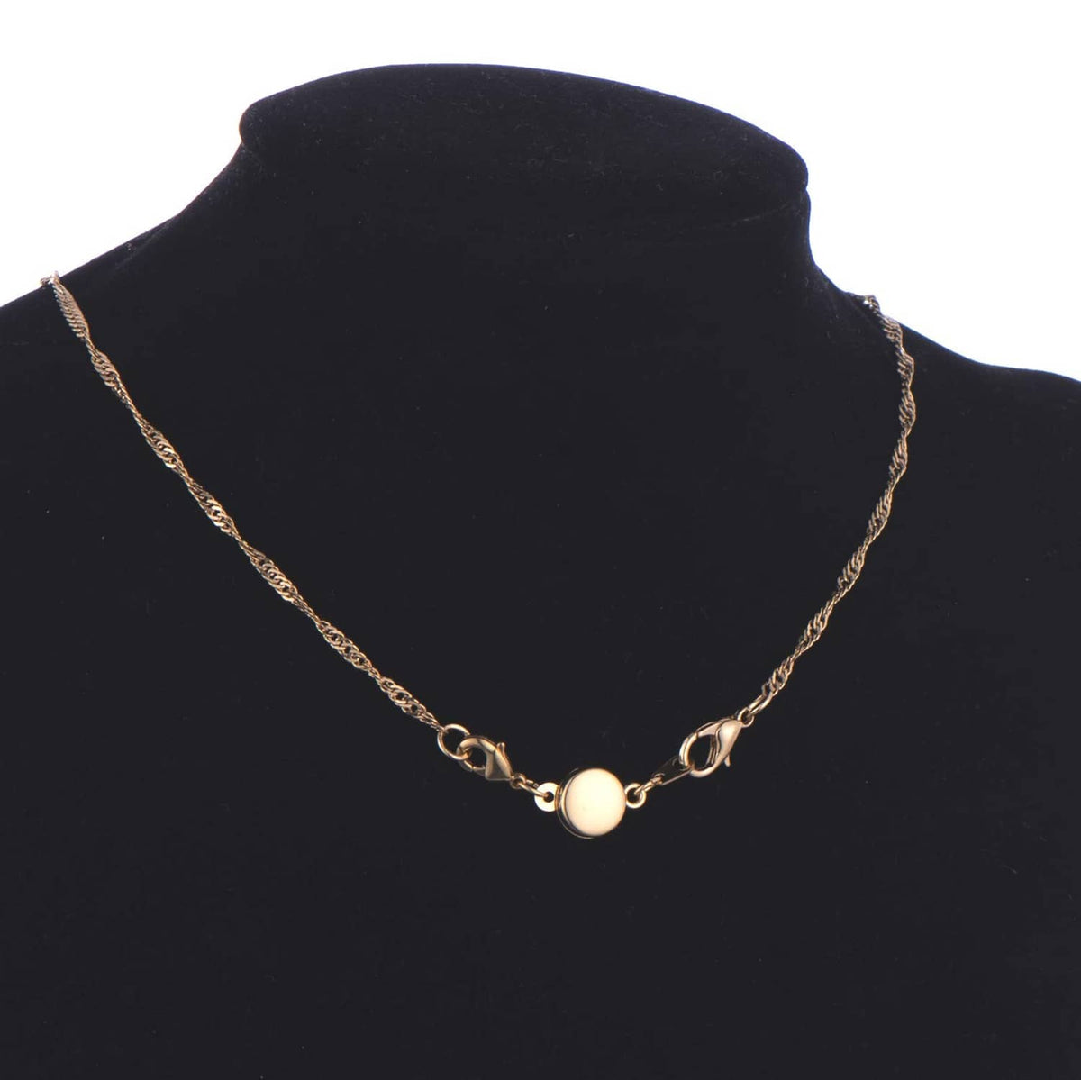 Gold-tone necklace with chain links and round magnetic clasp discs on the front
