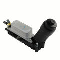 Oil filter adapter housing with metal heat exchanger plate and black plastic body