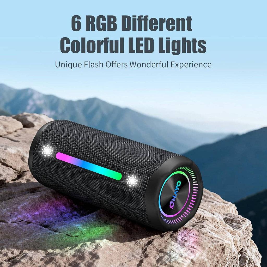 Black cylindrical Bluetooth speaker with horizontal RGB LED bar and glowing front ring
