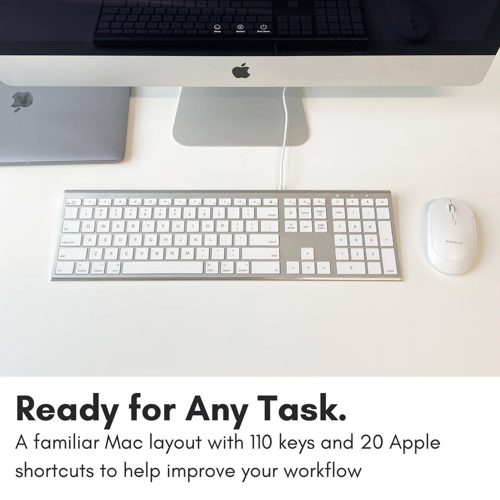 Silver full-size wired keyboard with white keycaps and slim aluminum design