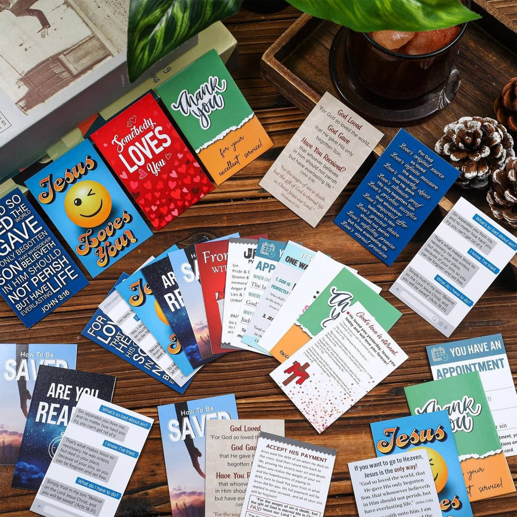 Multicolor gospel tract cards scattered on wooden table with various designs