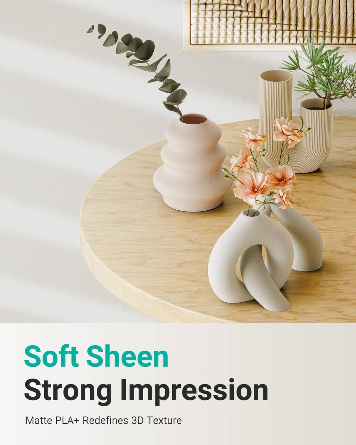 White 3D printed vases and sculptural figure on a light wood surface