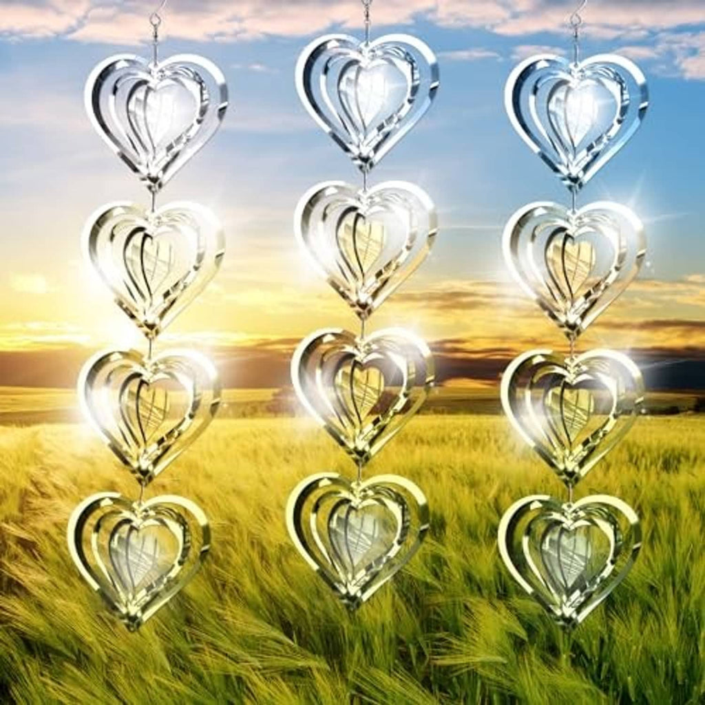 Set of shiny chrome heart wind spinner bird deterrents, multiple hanging discs with hooks.