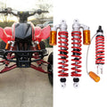ATV air shock absorbers set with red coil springs and orange reservoirs, front and rear