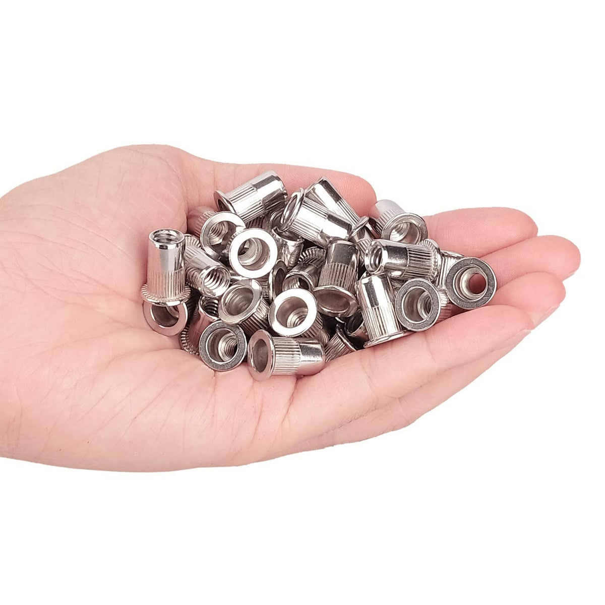 Stainless steel 1/4"-20 rivet nuts held in hand, knurled outer grip