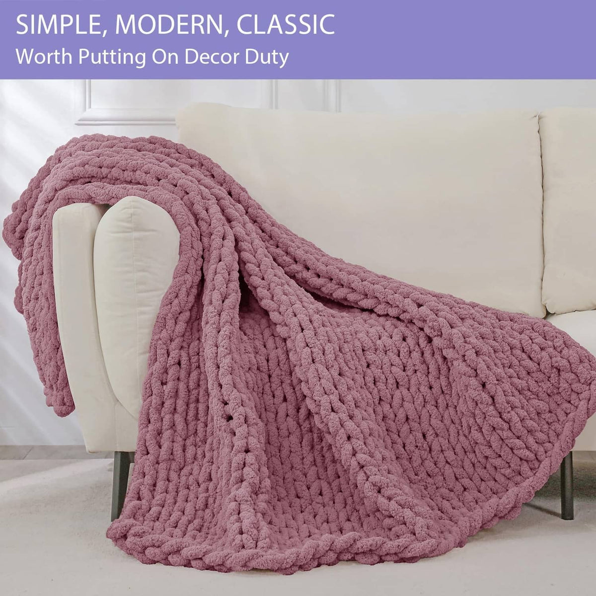 Chunky knit throw blanket, burnt rose, draped over sofa arm, plush thick weave