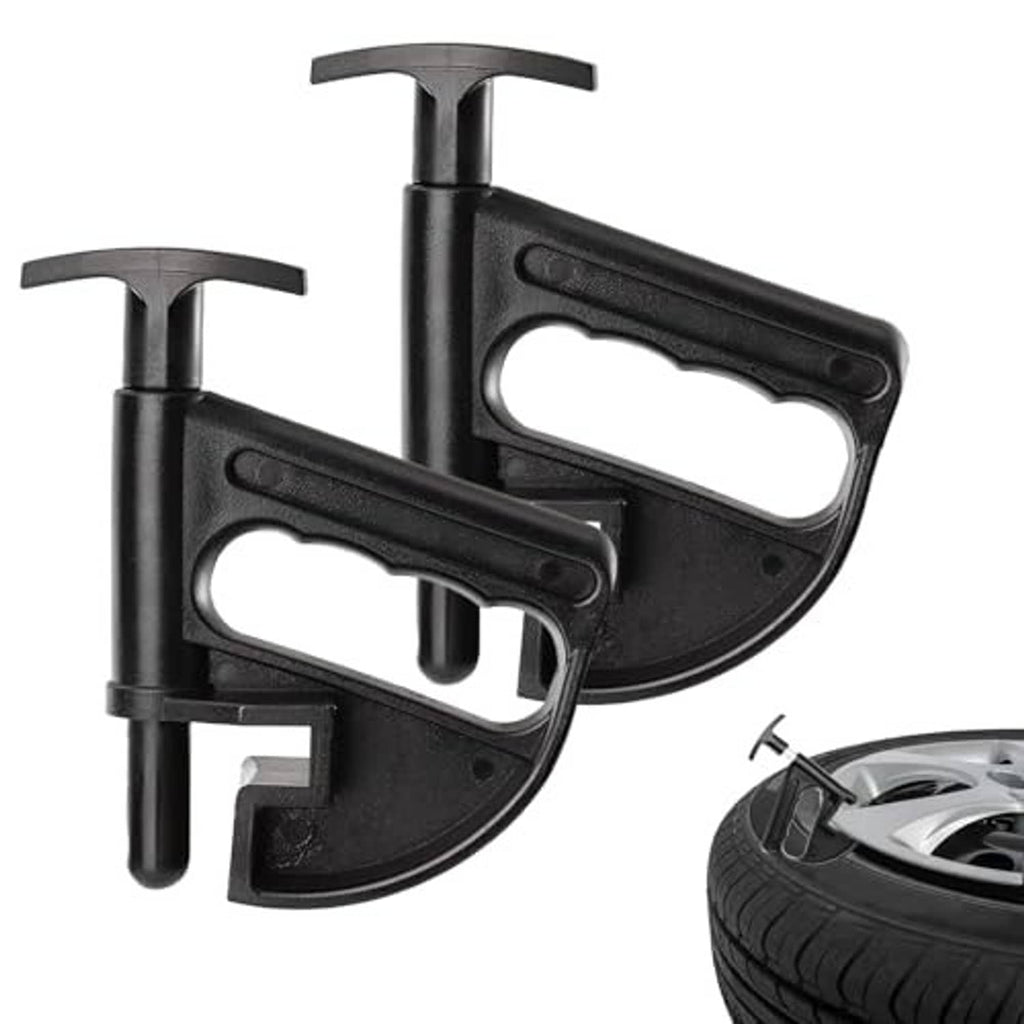 Universal tire bead clamp pair with curved jaw and long pry handles by a wheel