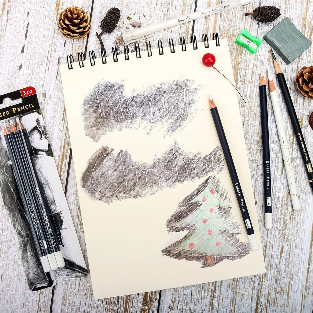 3-piece eraser pencil set with dark barrels and white tips beside sketch paper