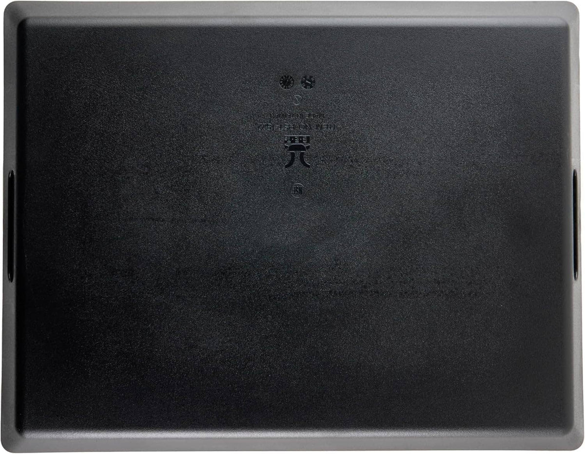 Rectangular black serving tray with two side handle cutouts and flat interior