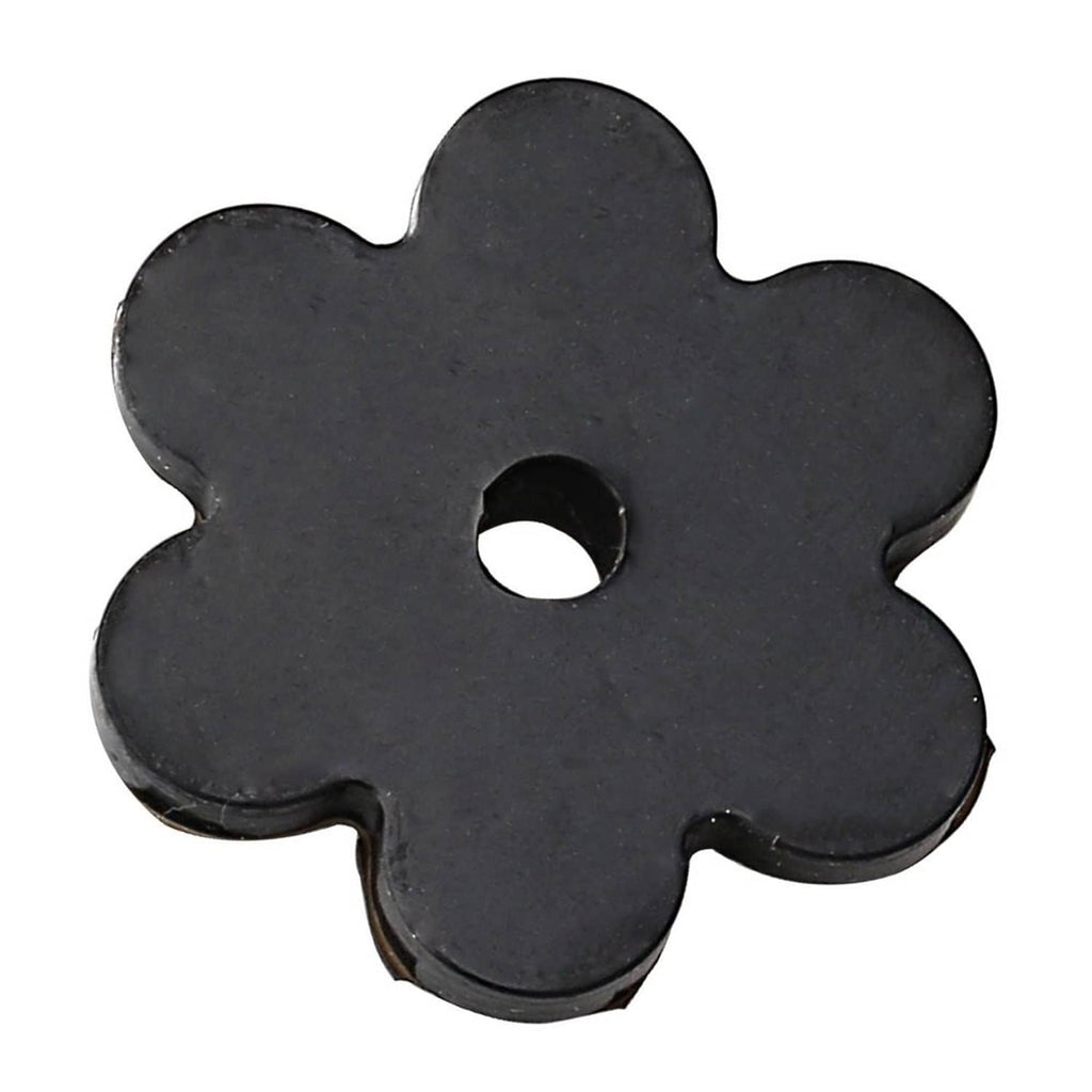 Black flower-shaped rubber flag stopper with center hole for securing flag poles