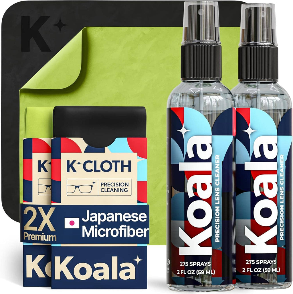 Koala lens cleaner spray kit with two clear bottles, black sprayers, and microfiber cloth pack.