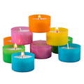 Multicolor tea light candles with lit wicks in orange, pink, yellow, blue, and green.