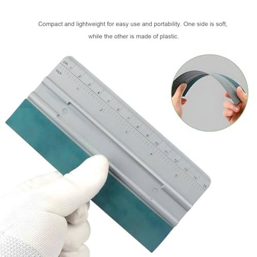 Felt squeegee applicator held in a gloved hand, with teal felt edge and ruler