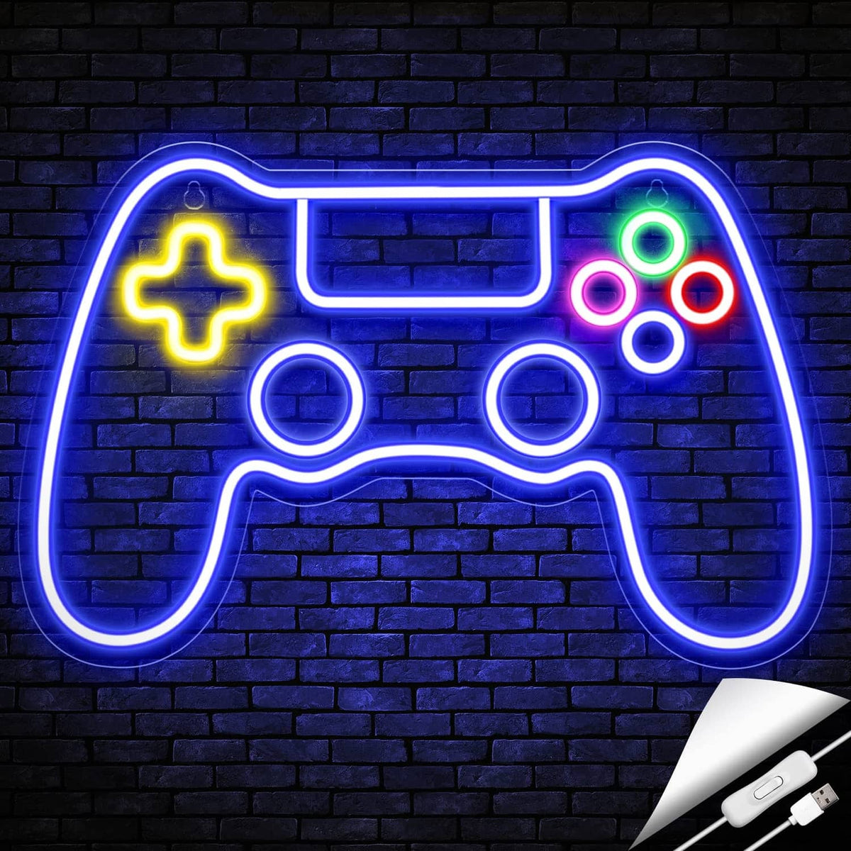Gaming controller LED neon sign with connected power cord against a brick wall.