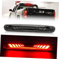 Third brake light with black housing, red LED strip, shown on vehicle rear