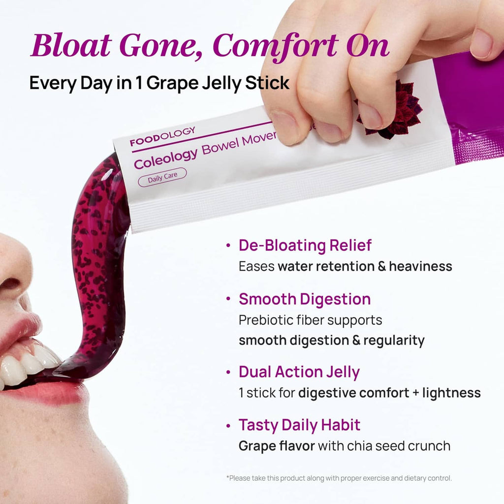 Grape bowel movement jelly stick in purple foil wrapper, held by hand