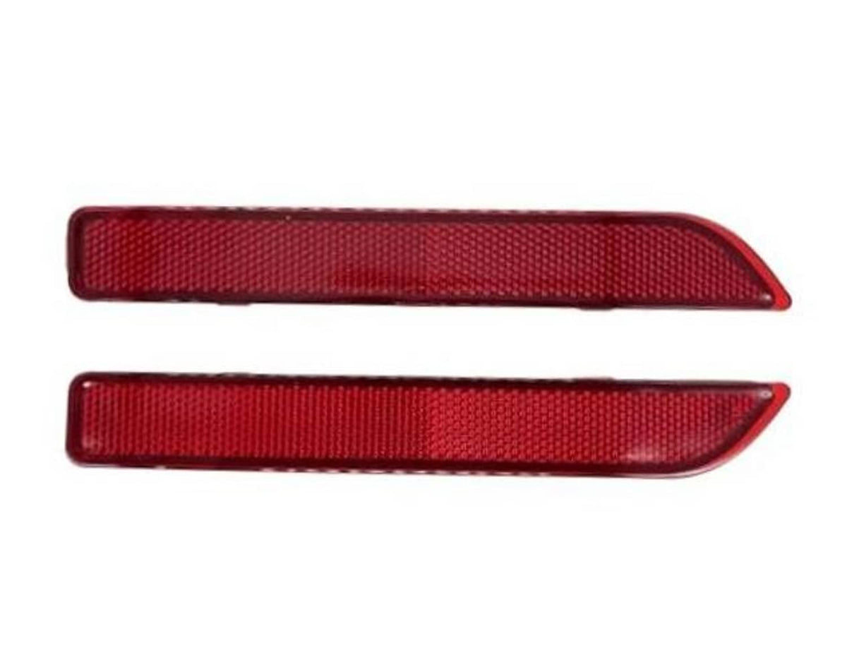 Pair of red rear bumper reflector lenses, rectangular with textured pattern