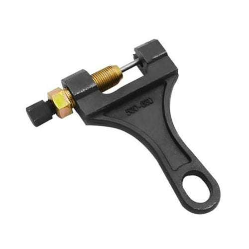 Black motorcycle chain breaker tool with gold screw and hex nut slot