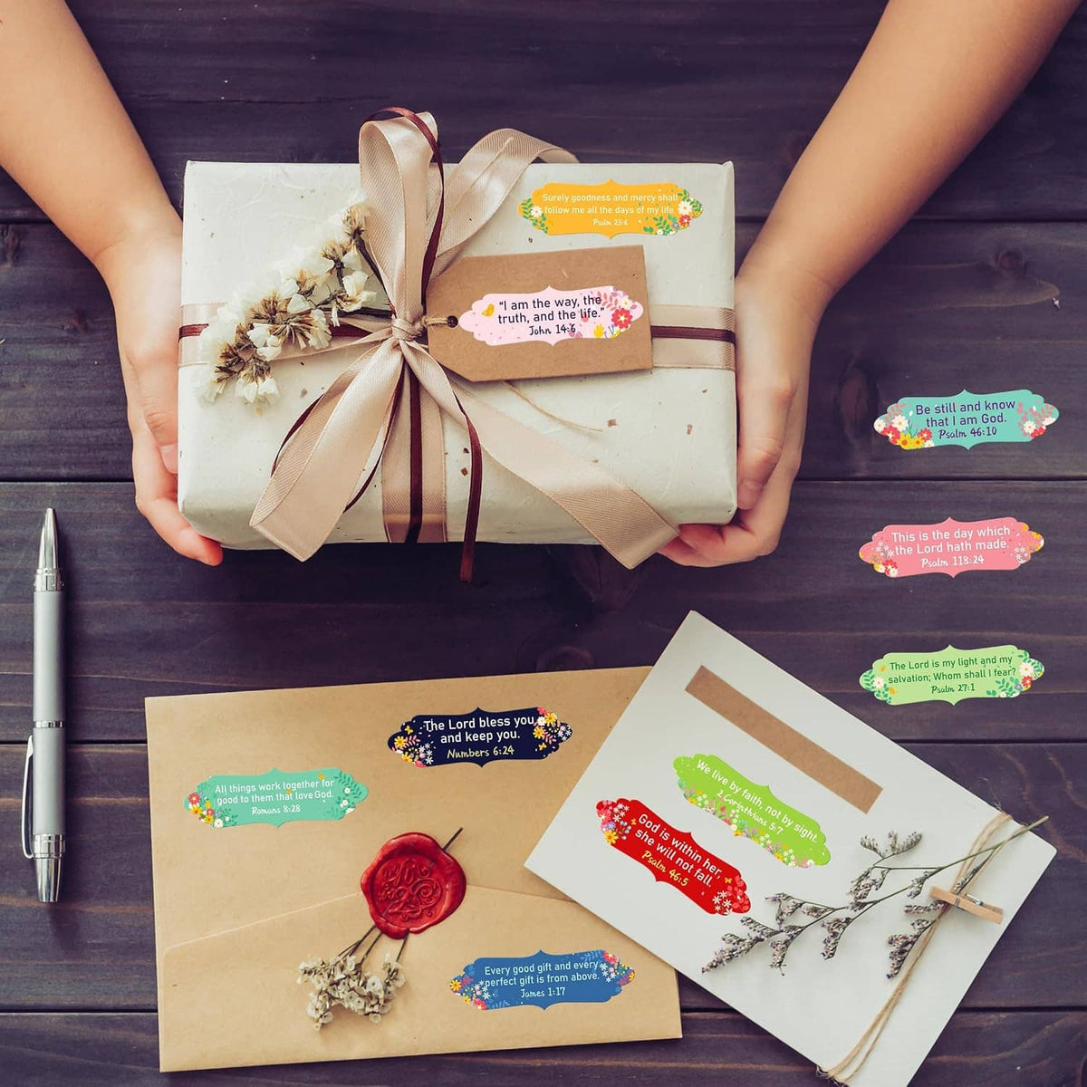 Bible verse stickers on envelopes and gift box, with small colorful label tags