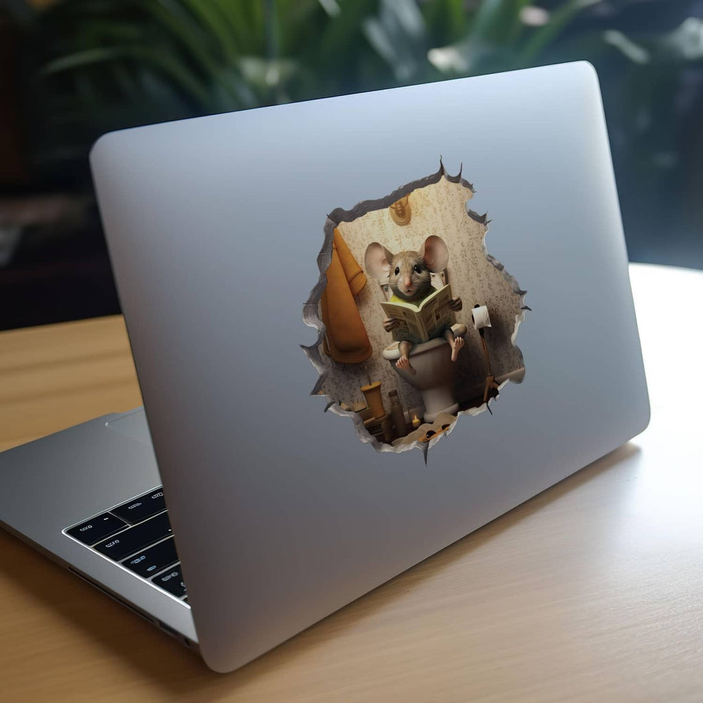 Mouse in toilet-hole decal sticker on white laptop lid with gray torn-edge border