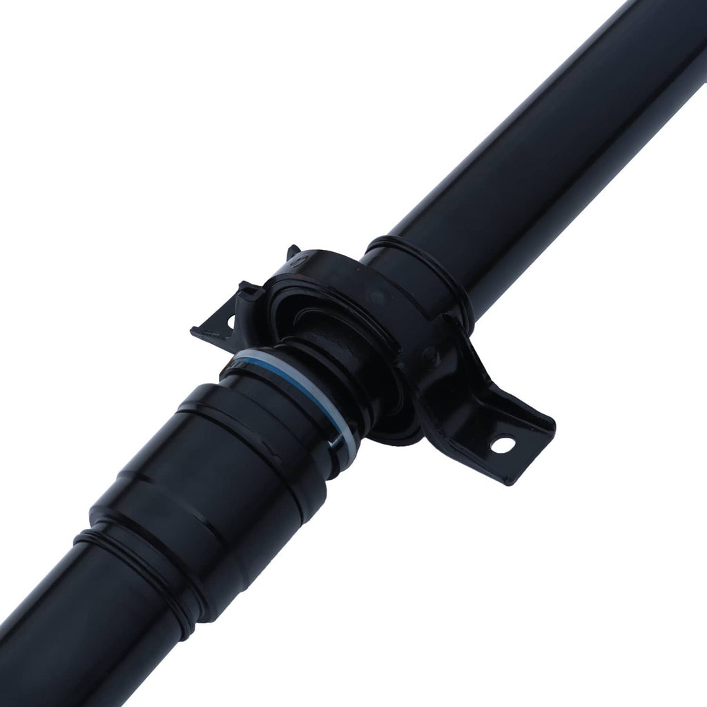Rear driveshaft assembly center coupling close-up with mounting bracket on black shaft