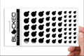 Tabbed webcam cover sticker sheet with black privacy oval shapes, shown flat in package