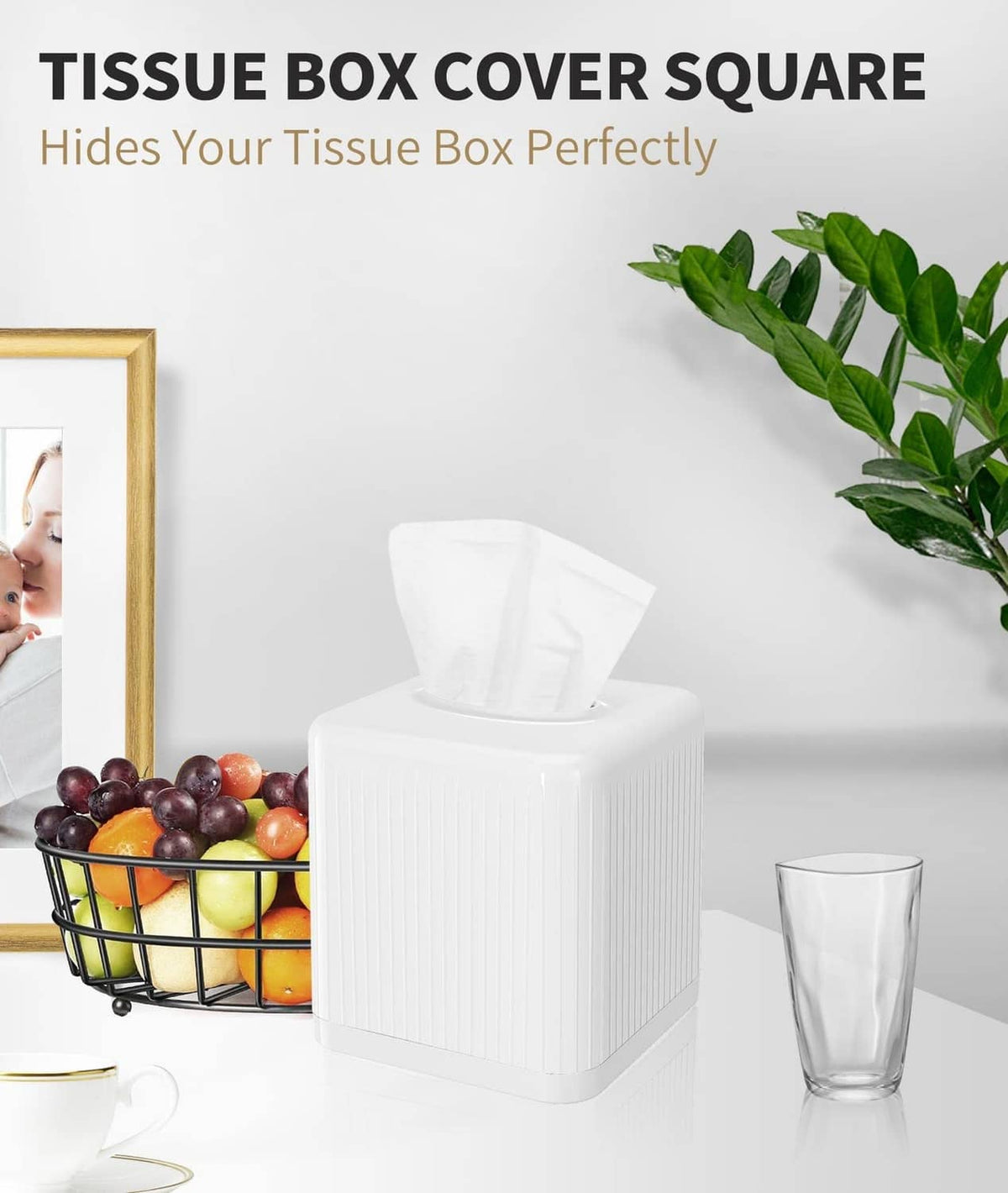 White square plastic tissue box cover standing on base with open top and tissue inside.