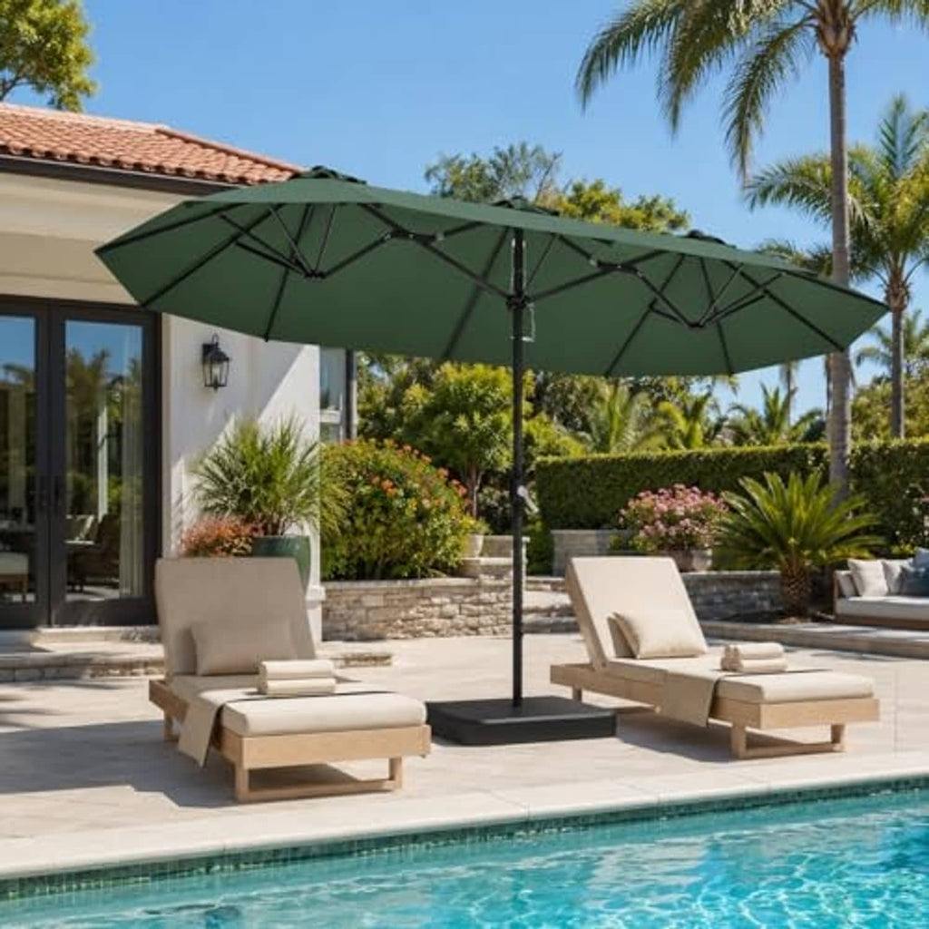 Dark green patio umbrella open over pool patio with metal stand and crank pole