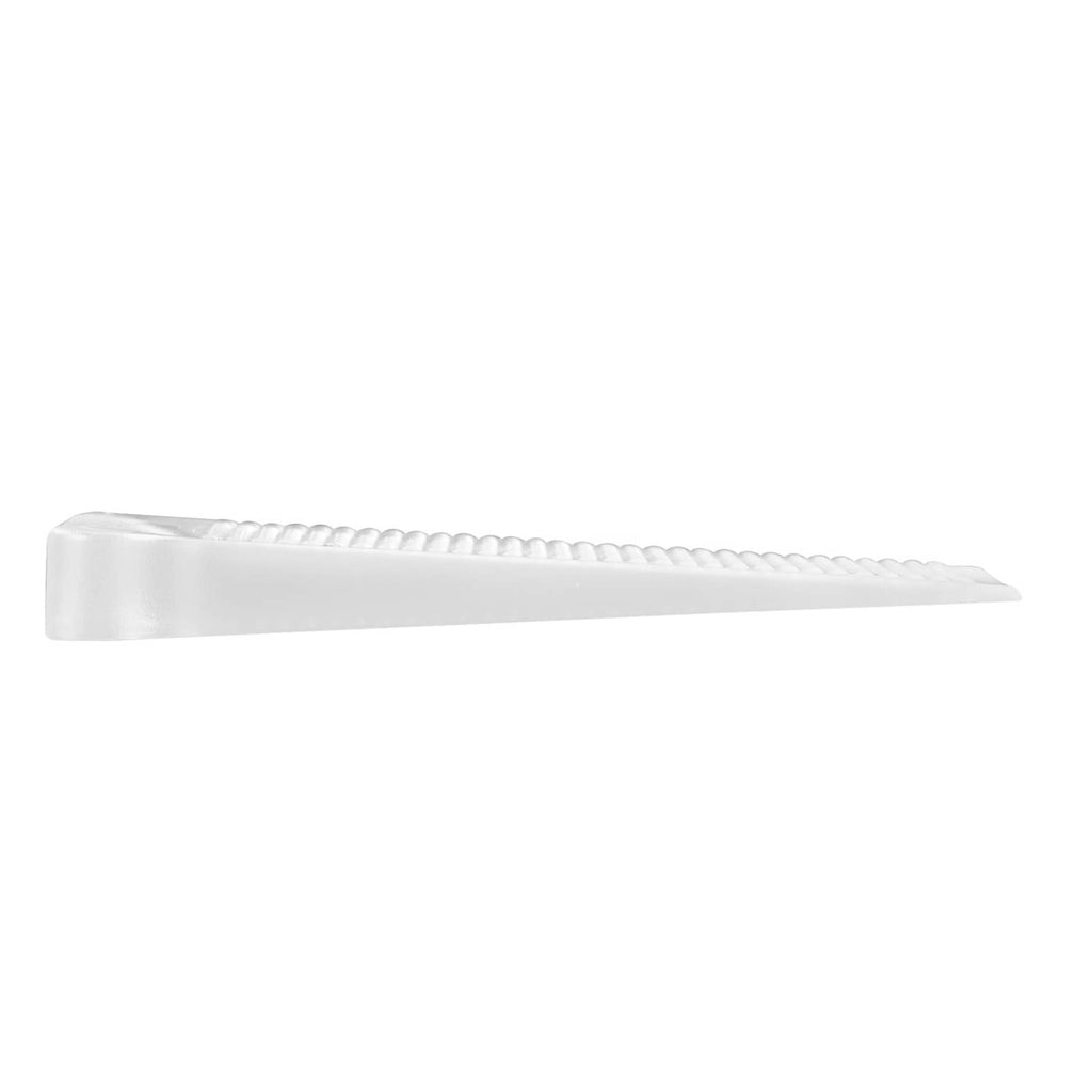 Transparent thin rectangular leveling shim with raised textured grip surface.