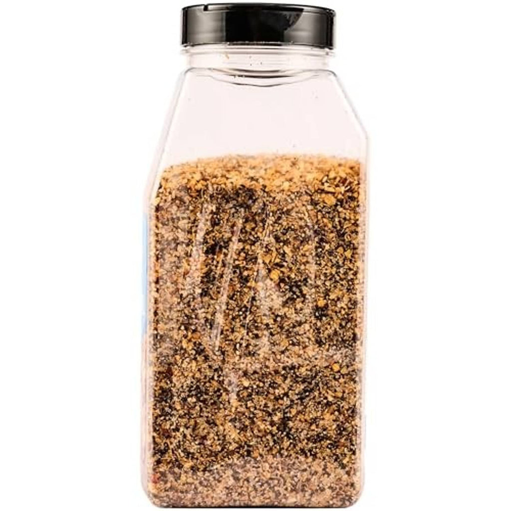 McCormick Grill Mates Montreal Steak seasoning bottle showing tan and dark spice blend