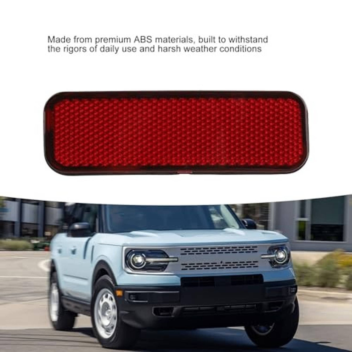 Red rectangular rear bumper reflector with textured surface and dark outer frame