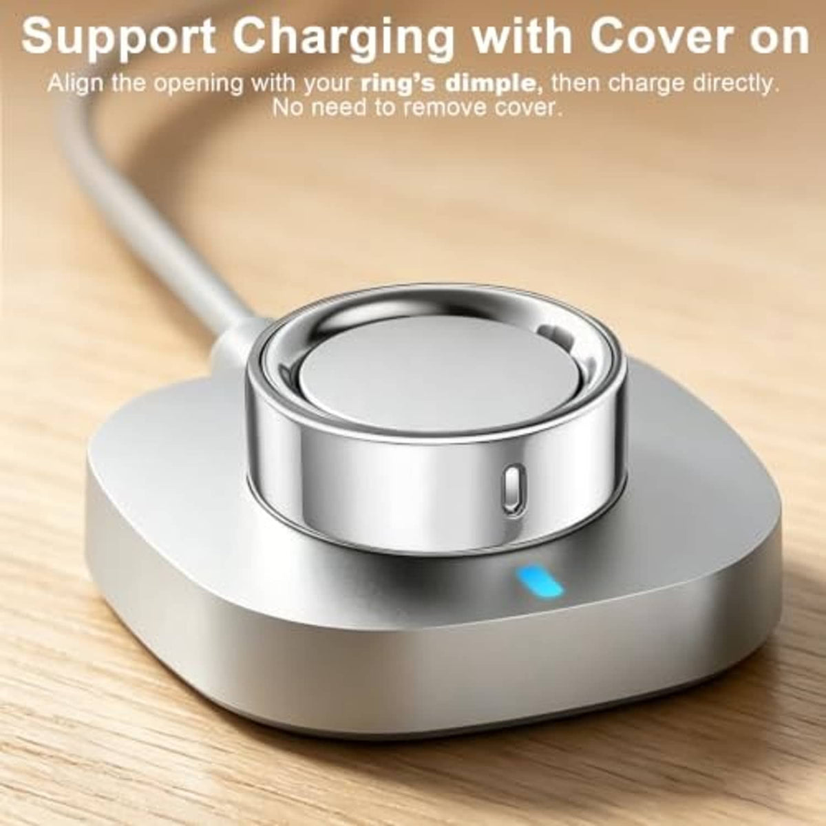 Silver TPU Oura Ring cover on charging dock, open top for charging