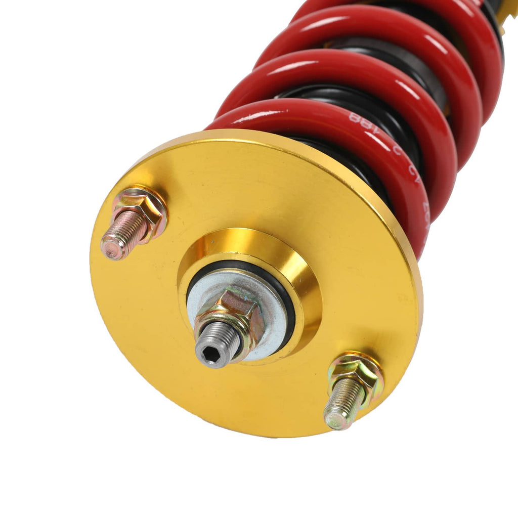 Gold adjustable top mount for coilover strut with red spring and threaded shock body