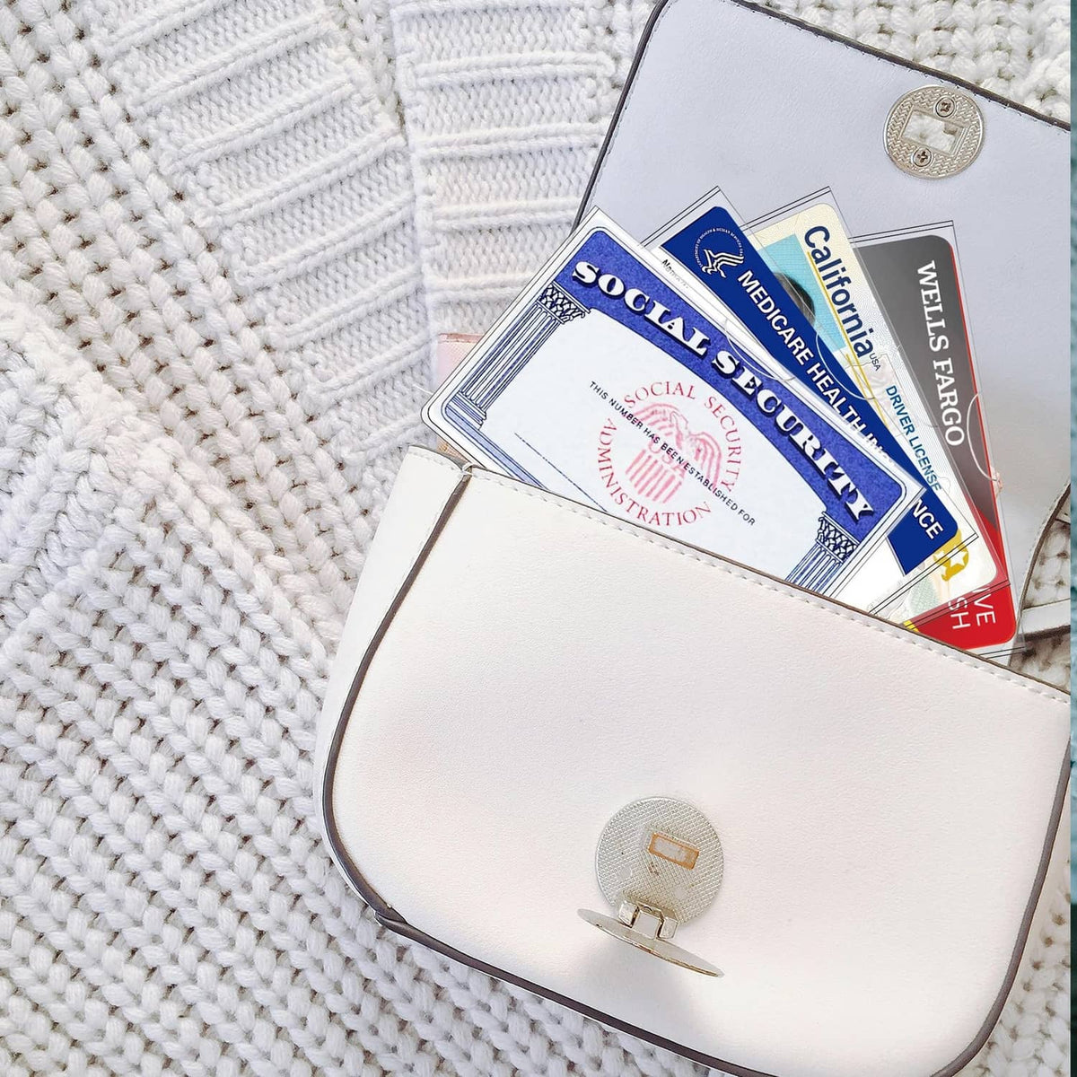 Clear Social Security card protector tucked into a white wallet pocket with other cards