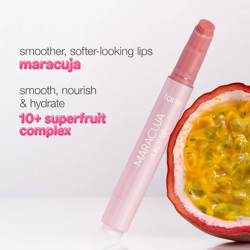 Maracuja juicy lip balm gloss tube with coral-pink balm swatch and fruit slice