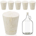 Light brown cork carboy stoppers and clear glass one-gallon bottle with cork cap