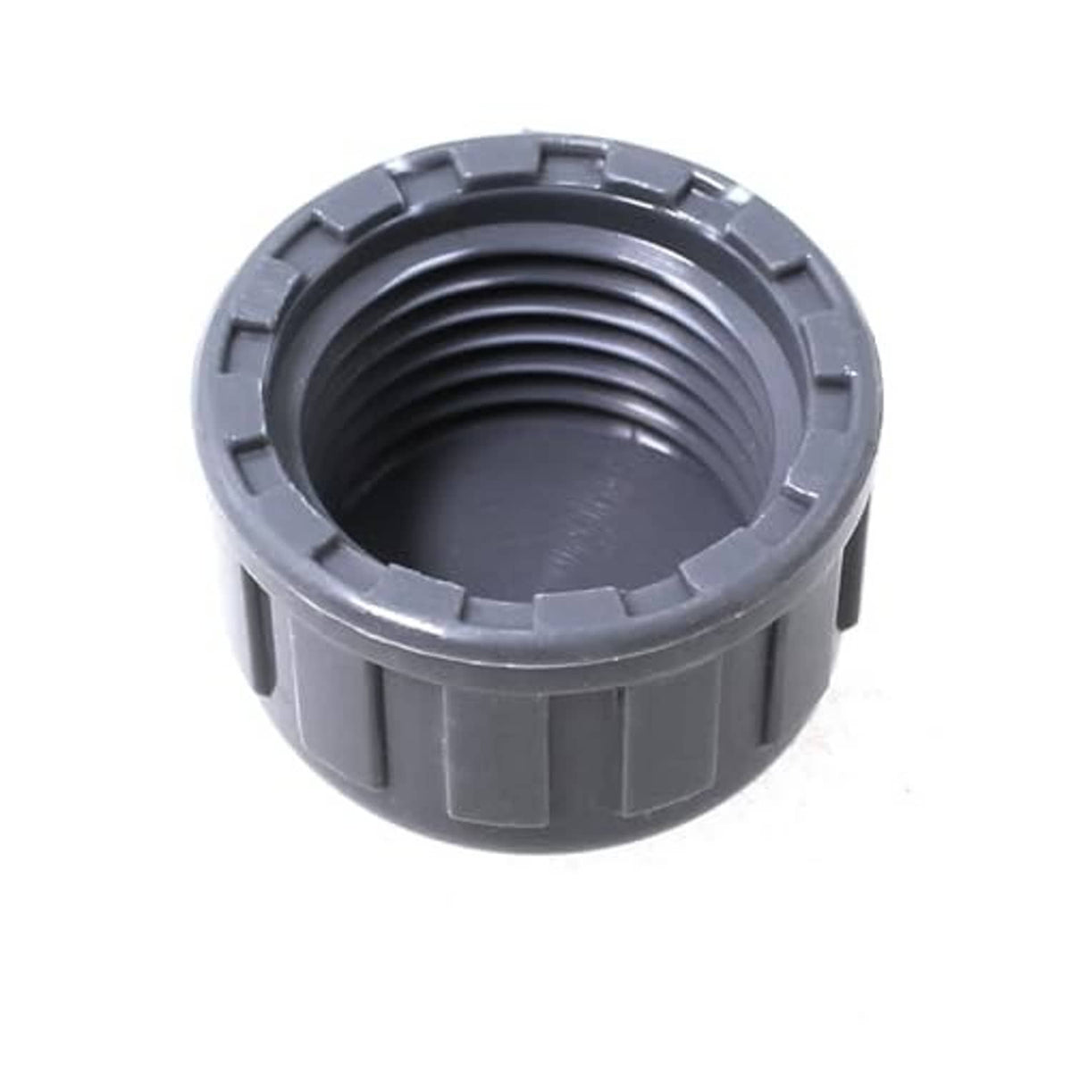 Grey PVC threaded cap plug adapter showing internal female thread opening