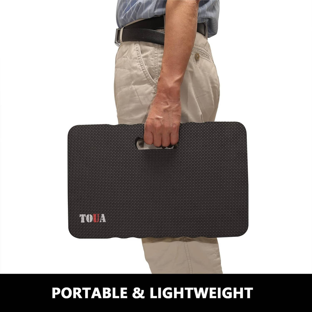 Large dark gray kneeling pad with carry handle, shown being held for portability.