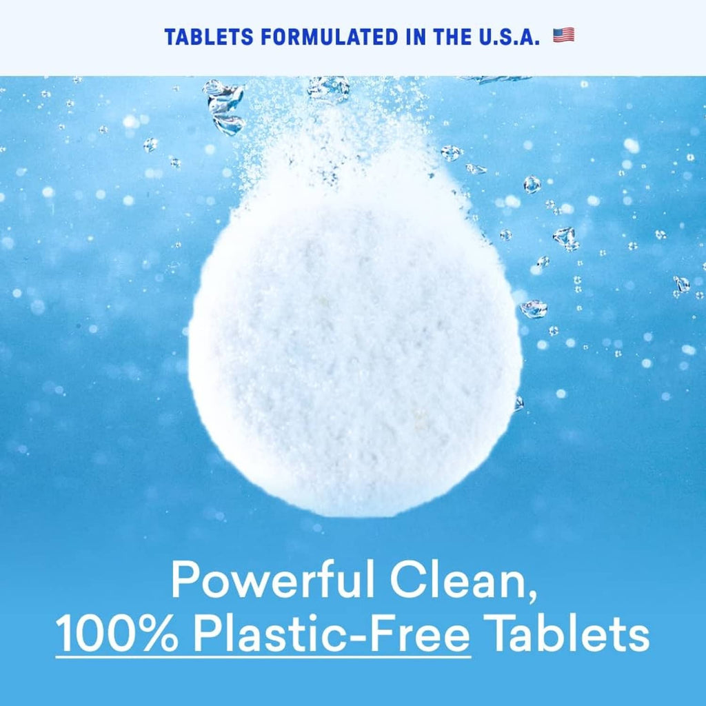 White laundry detergent tablet with surrounding splash-like granules